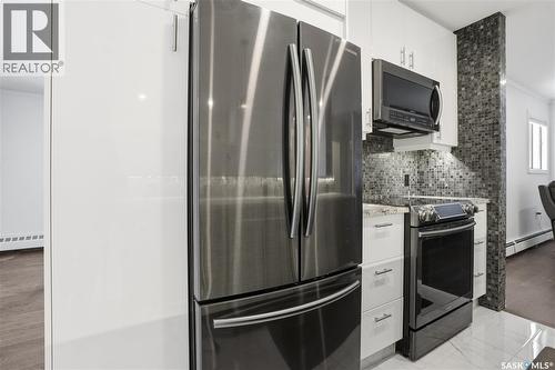 309 3410 Park Street, Regina, SK - Indoor Photo Showing Kitchen With Stainless Steel Kitchen With Upgraded Kitchen