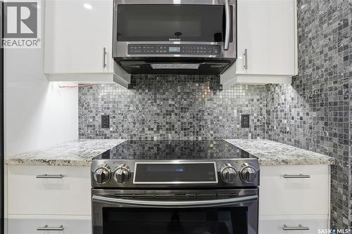 309 3410 Park Street, Regina, SK - Indoor Photo Showing Kitchen With Upgraded Kitchen