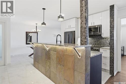 309 3410 Park Street, Regina, SK - Indoor Photo Showing Kitchen With Upgraded Kitchen