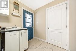 Laundry Room with back door access - 
