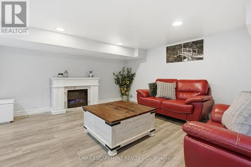 81 Simcoe Street E, Hamilton, ON - Indoor Photo Showing Living Room With Fireplace