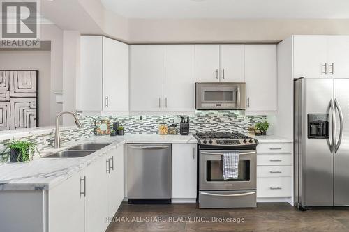 Stainless Steel Appliances & Marble Countertops - 114 Six Point Road, Toronto, ON - Indoor Photo Showing Kitchen With Stainless Steel Kitchen With Double Sink With Upgraded Kitchen