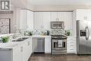 Stainless Steel Appliances & Marble Countertops - 114 Six Point Road, Toronto, ON  - Indoor Photo Showing Kitchen With Stainless Steel Kitchen With Double Sink With Upgraded Kitchen 