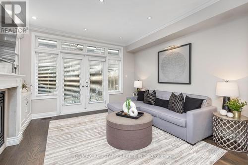 Living Room With Walk-Out to Deck - 114 Six Point Road, Toronto, ON - Indoor Photo Showing Living Room With Fireplace