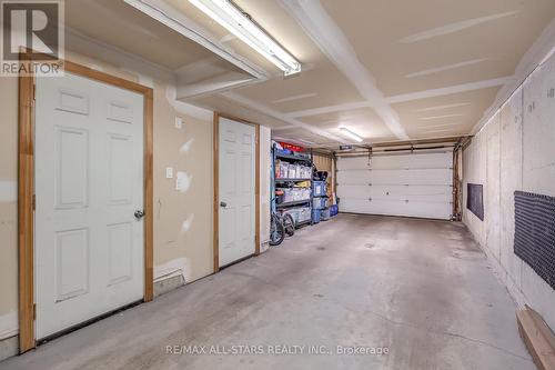 Tandem Double Car Garage & Storage - 114 Six Point Road, Toronto, ON - Indoor Photo Showing Garage