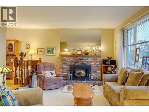 1107 29 Avenue, Vernon, BC - Indoor Photo Showing Living Room With Fireplace