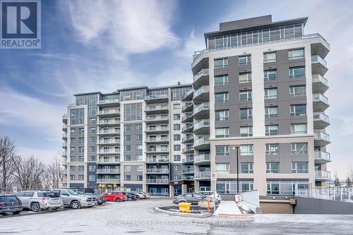 1106 - 58 Lakeside Terrace, Barrie, ON - Outdoor With Balcony With Facade