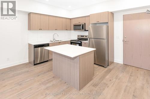 1106 - 58 Lakeside Terrace, Barrie, ON - Indoor Photo Showing Kitchen With Stainless Steel Kitchen