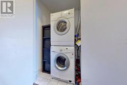 Stacked washer/dryer plus storage - 