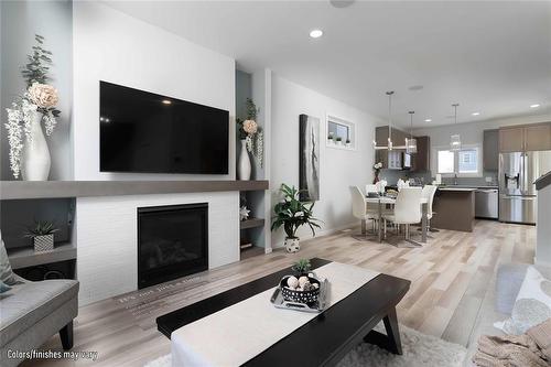 88 Bear Creek Bay, Winnipeg, MB - Indoor Photo Showing Living Room With Fireplace