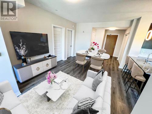 435 - 128 Grovewood Common, Oakville, ON - Indoor Photo Showing Living Room