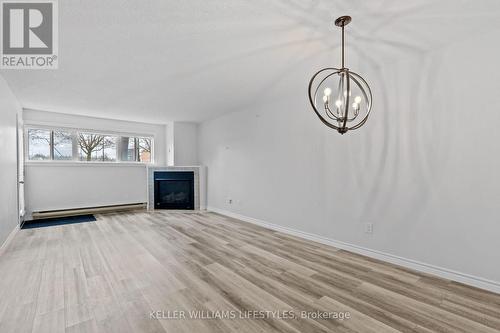 105 - 15 Jacksway Crescent, London North (North G), ON - Indoor Photo Showing Other Room With Fireplace