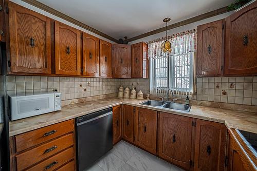 Cuisine - 124 Rue Poitras, Val-Des-Sources, QC - Indoor Photo Showing Kitchen With Double Sink