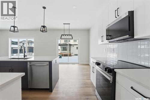 211 Sharma Lane, Saskatoon, SK - Indoor Photo Showing Kitchen With Upgraded Kitchen