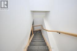 The updated stairs to the basement. - 