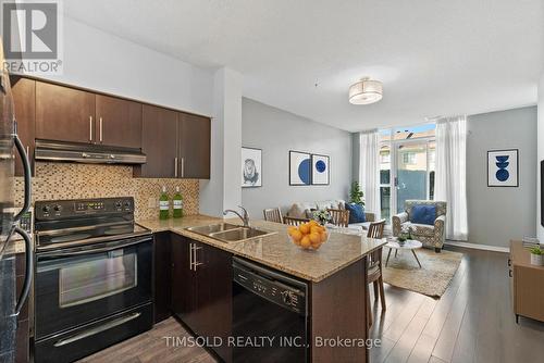 102 - 120 Dallimore Circle, Toronto, ON - Indoor Photo Showing Kitchen With Double Sink