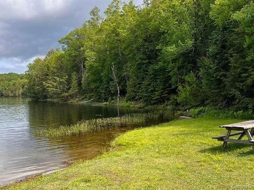 Access to a body of water - 16 Ch. De La Mésange, Val-Des-Monts, QC - Outdoor With Body Of Water With View