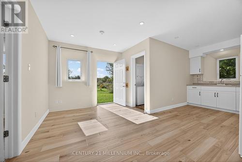 APARTMENT LIVING ROOM WITH ENTRANCE DOOR - 322066 Concession Road 6-7, East Luther Grand Valley, ON - Indoor