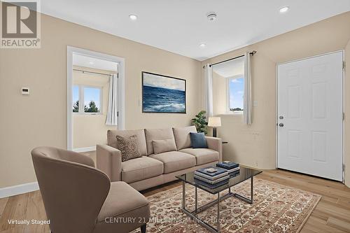 VIRTUALLY STAGED APARTMENT LIVING ROOM - 322066 Concession Road 6-7, East Luther Grand Valley, ON - Indoor Photo Showing Living Room