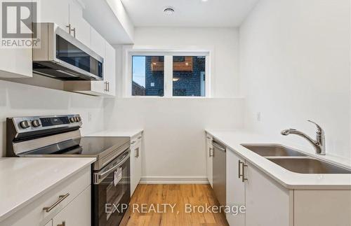 314 - 781 Clare Avenue, Welland, ON - Indoor Photo Showing Kitchen With Double Sink