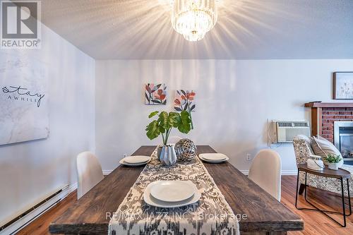 119 Wilmot Trail, Clarington (Bowmanville), ON - Indoor Photo Showing Dining Room With Fireplace