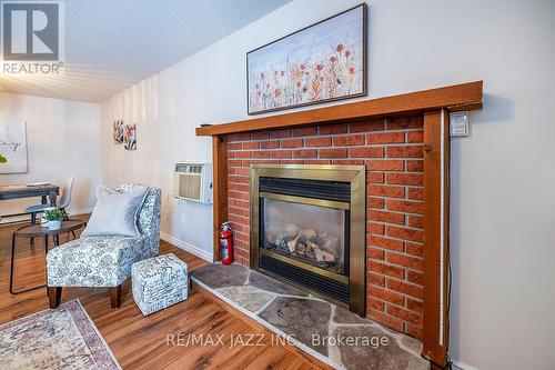 119 Wilmot Trail, Clarington (Bowmanville), ON - Indoor Photo Showing Living Room With Fireplace