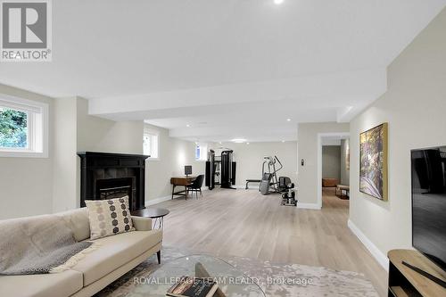 6196 Elkwood Drive, Ottawa, ON - Indoor Photo Showing Living Room With Fireplace