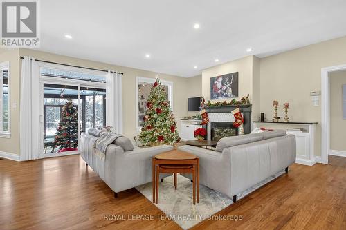 6196 Elkwood Drive, Ottawa, ON - Indoor Photo Showing Living Room With Fireplace