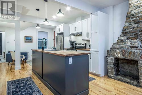 22 Henry Street, St. John'S, NL - Indoor Photo Showing Kitchen With Fireplace