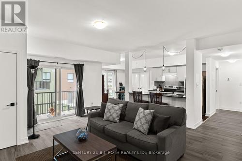 117 - 4 Spice Way, Barrie, ON - Indoor Photo Showing Living Room