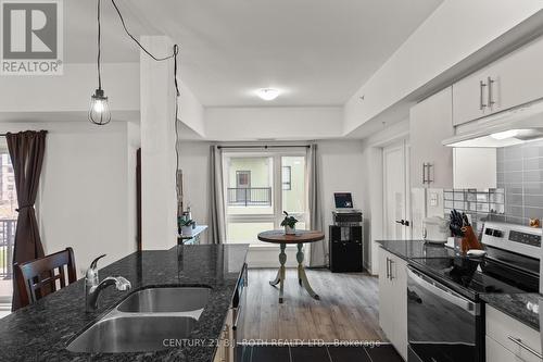 117 - 4 Spice Way, Barrie, ON - Indoor Photo Showing Kitchen With Double Sink With Upgraded Kitchen