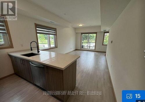 D208 - 200 Chester Le Boulevard, Toronto, ON - Indoor Photo Showing Kitchen