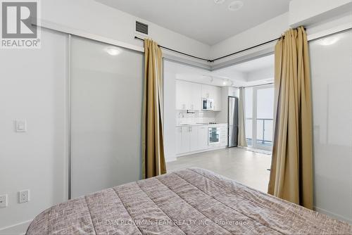 1121 - 2550 Simcoe Street N, Oshawa, ON - Indoor Photo Showing Bedroom
