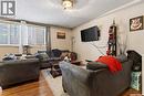 11 23 Centennial Street, Regina, SK  - Indoor Photo Showing Living Room 