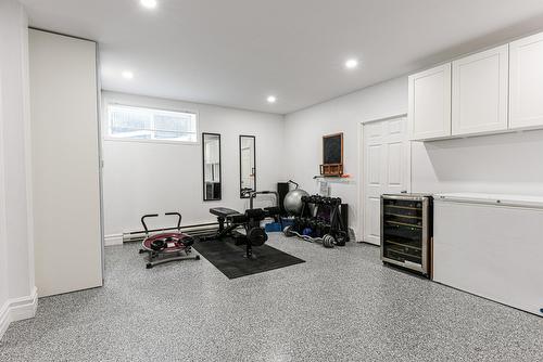 Playroom - 25 Rue Charlotte-Leduc, La Prairie, QC - Indoor Photo Showing Gym Room