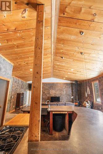 10 foot high wood cathedral ceilings - 11441 Levere Road, North Dundas, ON - Indoor Photo Showing Other Room