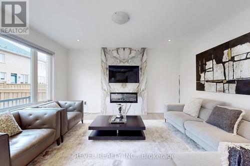 Porcelain Accent wall - 234 Wesmina Avenue, Whitchurch-Stouffville (Stouffville), ON - Indoor Photo Showing Living Room