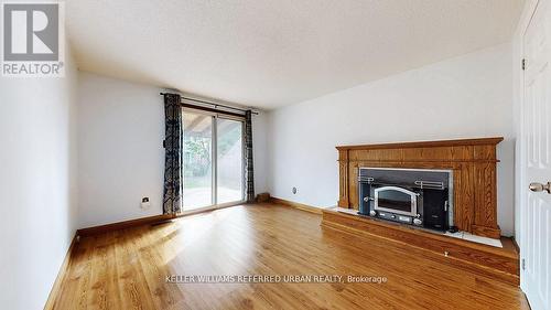 15 Thistlewaite Crescent, Toronto, ON - Indoor Photo Showing Living Room With Fireplace