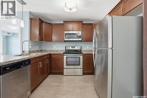 306 3630 Haughton Road E, Regina, SK - Indoor Photo Showing Kitchen With Double Sink
