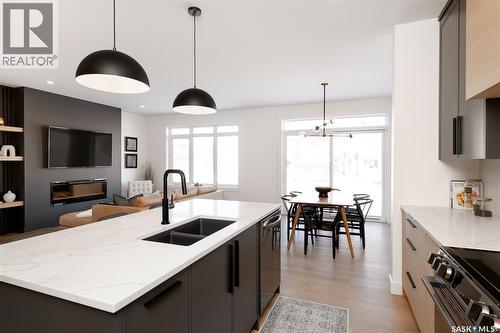 143 Cockcroft Place, Saskatoon, SK - Indoor Photo Showing Kitchen With Double Sink With Upgraded Kitchen