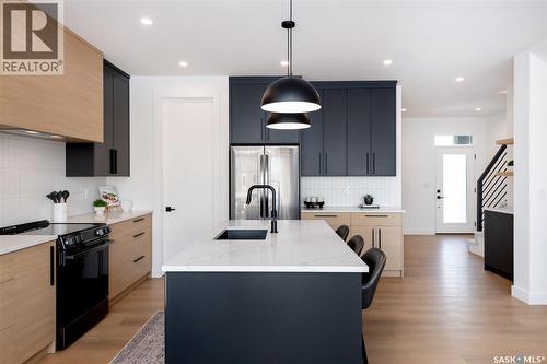 143 Cockcroft Manor, Saskatoon, SK - Indoor Photo Showing Kitchen With Upgraded Kitchen