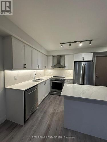 802 - 58 Lakeside Terrace, Barrie, ON - Indoor Photo Showing Kitchen With Stainless Steel Kitchen With Double Sink