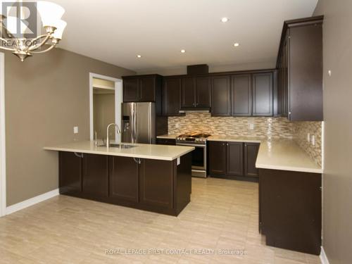 30 Forsyth Crescent, Springwater, ON - Indoor Photo Showing Kitchen With Upgraded Kitchen