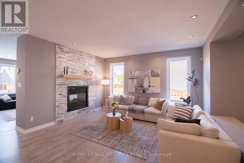 34 Keighley Circle, Ottawa, ON - Indoor Photo Showing Living Room With Fireplace