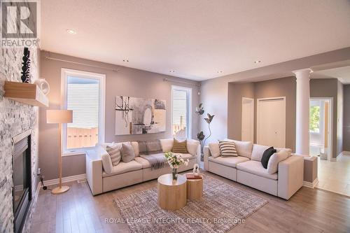 34 Keighley Circle, Ottawa, ON - Indoor Photo Showing Living Room With Fireplace