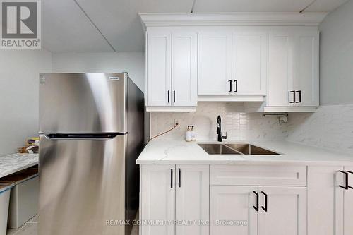 213 - 2 Glamorgan Avenue, Toronto, ON - Indoor Photo Showing Kitchen With Double Sink