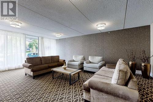 213 - 2 Glamorgan Avenue, Toronto, ON - Indoor Photo Showing Living Room