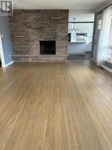 312 Grantham Avenue, St. Catharines, ON - Indoor Photo Showing Living Room With Fireplace