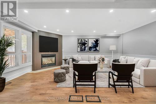 Spacious Open to Kitchen Family room Staged - 6062 Prairie Circle, Mississauga, ON - Indoor With Fireplace