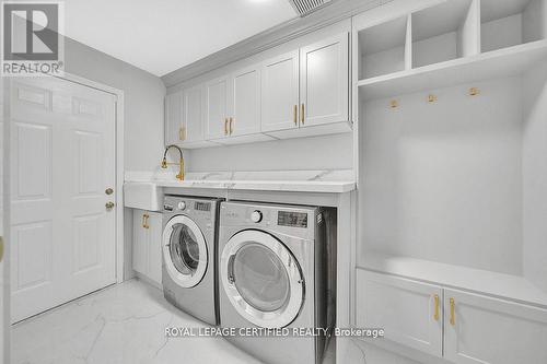 Upgraded Laundry room with bench - 6062 Prairie Circle, Mississauga, ON - Indoor Photo Showing Laundry Room